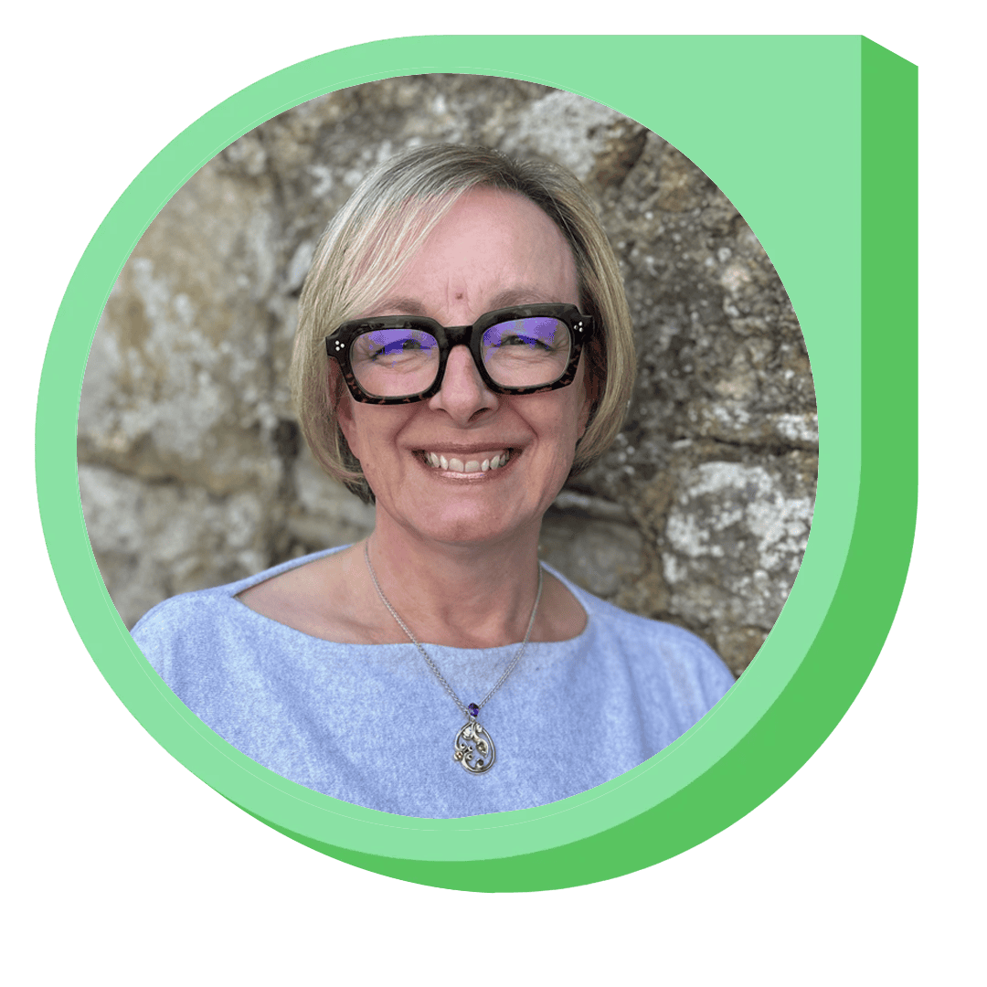 Smiling woman with glasses outdoors at ViableWay office.